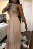 The material is definitely good quality. I am happy with the way it fits - I was worried I wasn't going to fit the small because I am in between sizes. I bought this as a bridesmaid dress - I feel the pink looks more like a nude pink than blush pink. There is also enough material in the bottom that you can alter for any height or heel height. It was a reasonable price - but didn't expect the duty fees (from Canada). Will order again regardless. - Charlotte S.
