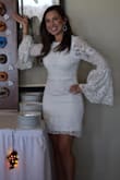 I wore this dress for my bridal shower, and I received so many compliments on it. It was absolutely stunning. At first, I was hesitant about the sleeves, but ended up falling in love with them. My only complaint would be that some of the lace stitching on the back of the dress ripped by the end of the shower, so quality was not as great as would have been expected. - Amber W.