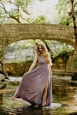 We ordered this dress for one of my daughter's outfits for her senior photos. We couldn't be happier with this beautiful dress! She loved it, and it photographed beautifully. It was a tad loose in the chest, but we used two-sided tape, and it worked great. - Claudia W.