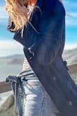 These are definitely my new favorite denim!!! The light wash and frayed hem are perfect for spring/summer. Ordered a size M and they're a little big but the tie front and high waist make it work. If you're between sizes, size down. - Katie G.