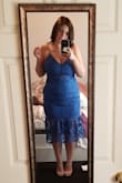 I haven't worn it to my event yet, but I keep trying it on in my room and throwing shoes on because I love it so much! I worried it would be a little small when I ordered but it's absolutely perfect! The fabric doesn't stretch though, so I'm not sure how that will feel during the sitting, dancing, and moving that I'll be going at the wedding but I'm confident that I'll be comfortable in it. All in all I wish there was a little give in the fabric but I love the way this dress looks on! Oh and I LOVE the color of this blue! - Candace H.