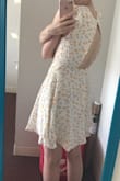 The material is very high quality, not see through at all. If you have a smaller chest the top may look a bit loose but it was nothing too bad for me, a simple safety pin should work. The fit is really a gamble depending on your shoulder/chest size I think, good thing there is free exchanges! - Elizabeth J.