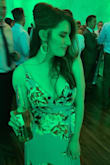 DRESS SIZE IN PHOTO- SMALL! I originally ordered a medium (my standard dress size), it was incredibly too long and way too big. 

Exchanged for a small- was still too big, but doable. I honestly could've  gotten away for an extra small. The bottom has a lot of fabric and little too heavy/long. Heels were a must. 

But very pretty, great spring inspired dress!!! - Madison G.