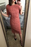 This dress is exactly what I needed for my goddaughter's communion. The color looks exactly like the picture and the lace gives the dress a sweet touch for the occasion. It does fit a little small around the waist but is still comfortable. If I would have sized up I feel that it wouldn't hug my curves as nicely as the x-small does. Overall I'm very happy with this dress! - Monica M.