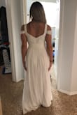 This dress is perfect!!! The material is great quality and it will be perfect for my summer wedding! It's a bit long and the straps are a little bit loose, but it's nothing a tailor can't fix. I absolutely recommend this beautiful dress! - Abigail B.