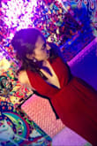 The one-piece berry red romper fits like a glove! It feels like I'm wearing pajamas but I have on an outfit that looks like I'm rocking high-end material. The romper is soft fabric and very delicate. It says dry clean only, but was okay being hand washed. I rocked this outfit out in DC to a pop up bar in got so many compliments with my boyfriend! This is easily one of my new favorite pieces. - Brianna H.