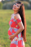 Love love the dress. I used to wear size XS before I got pregnant. Now size M is perfect for me as I'm 22 weeks pregnant. - Nina R.