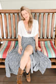 I bought this for a music festival in Colorado. It was perfect and fit so nicely with a bralette underneath. If you are looking for a flowing peasant top this will go great with jeans or hippie skirt. - Kat Y.
