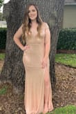 This dress is gorgeous and fit well. I originally ordered a large, which is usually the size I wear and had to send it back and reorder a medium. So I definitely recommend ordering a size down from what you typically wear. - Trinity D.