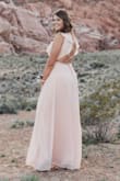 I ordered this dress for prom and loved it! I normally wear a medium and that's what I got and it fit! You can tighten the top as tight as you want and the waist fit and looked so nice. The length was perfect considering I'm tall and even with heels the dress still touched the ground. Overall 11/10 loved it! - Siena S.