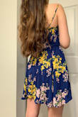 This is a super cute summer, casual, fun dress to wear! I attached some pictures of myself wearing it and for reference, I did tighten the straps because I felt like they were too 'loose'. I have neutral/yellow undertones, and the color really flatters me, so if you are of similar tone I say go for it!

Also, while I do agree that this can definitely be a braless dress, I think that I personally will end up wearing a strapless one with it. It looks lovely either way, but I guess due to my boob shape (??) a bra underneath looks much more put together, haha.

Can't wait to wear this to the beach or on a date or to the mall with a denim jacket! - Jenny J.