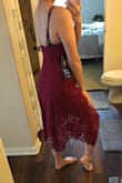 I was hesitant about the hem of the dress being asymmetrical, but I ended up liking it. I prefer longer dresses and it's a good length, although someone shorter may not like it. I like the red color and think it would look good on anyone. - Uyen N.