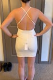 I really liked the back of this dress, and the back looked great. However, the front looked a little strange on my chest. It may be because I have a little bit of a larger chest, but I didn't really like how that part fit. - Kaelin W.