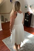 Bought this dress for engagement photos I am taking while on vacation in Hawaii! I've been searching for a simple white dress to wear, soo glad I found it! - Nicole R.