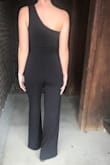 This jumpsuit was exactly like the photo! I was very happy with this purchase. It was a little tight around the middle, so I would go a size up. - Abbie J.