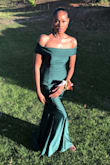 This dress fit perfectly! I measured my daughter and ordered according to measurements and it was spot on! She wore to her prom and it was stunning!! The color was exactly how it appears on line. The material was very comfortable to wear. She is tall, to me, and the length was perfect. She got so many compliments because it is truly an amazing dress! If you're looking for something simple but eye catching and that will turn heads this is the dress! We are super pleased with our purchase! - Mellisa C.