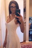 I'm very picky and I usually always have to get my dresses altered due to my large bust and small waist, but the XS fit like a glove. Not too tight and not too large. Well made and you can move freely. I love that there is a classic slip underneath so that it is always smooth on your body. Very flattering. - Stephanie B.