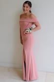 We bought this dress in Mauve Pink in a size Medium, and it fit my teenage daughter perfectly - no alterations or hemming necessary! We just had to press it a bit before she wore it. She wore this off-the-shoulder dress for her first high school Prom and received tons of compliments from her fellow students as well as parents! The medium-weight material wears very well, did not wrinkle through the night, and comfortably hugged her curves. This dress is simple and understated, but extremely flattering, classy, and elegant. Highly recommend! - Michelle L.