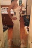 I like my dresses fitting rather snug, and XS usually fits me perfectly and exactly as I like. However, this one is slightly too tight. It will do. I love the lace, the sash around the midsection, the fact that it's cream, and the scalloped top. The only other issue I have with this is that I am a 32D, and the top doesn't cover me completely. The fabric pulls, so I took it to a tailor to have her add fabric.
I'm wearing this for my court wedding and will be a little on the fancier side, but I will be so happy to wear it. :) - Courtney R.