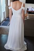 This dress is gorgeous and runs true to size! It's very high quality! - Bailey C.