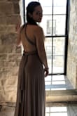 I wore this to a wedding recently and received many complements on it. When I out it on I definitely spent a good amount of time just see how I wanted to wear the dress. the fabric felt very comfortable and I can't wait to wear it again with a different configuration!! - Alannah M.