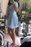I love this dress! Completely true to size (the size chart places my measurements as Small and Small is what I ordered). It's completely lined so its not see-through and you don't need a bra. The fabric is looks and feels much nicer than it does online, it's very soft and floaty. There is no stretch. The tie-back makes the waist adjustable. I love all three colors, but I don't have any other blue dresses so I got this one. - Phoebe M.