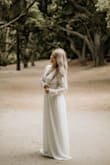 It was a little loose on the arms, but overall beautiful! It was long, so if you are short may need alterations, but I liked the long length! - Kristen P.