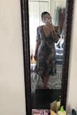 This dress fits so perfectly and doesn't cut me off at a weird length since I'm short and always struggle with midi lengths. It hugs my waist perfectly and the pattern is so pretty! - Cassidie M.