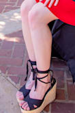 Although the shoes are super cute they are a bit too large for my liking. I'd try ordering a half a size smaller. They also have a tie around the heel so you can get them a bit tighter which is nice, but there is this big band around the back that doesn't get tighter and it stuck out which I didn't like (it was almost like they expect the people wearing these shoes to have huge ankles). - Shelby D.