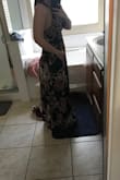 I love the way the dress fits. It did run a little long, so I had to get it altered. Besides that, I love this dress very much. - Lisett R.
