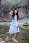 My daughter is in love with this dress! She wore it to some of her senior pics and loved it. Very comfortable! We usually have to visit the seamstress to get her dresses altered, but didn't have to for this one. I thought it was very classy looking. - Celeste M.
