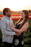 Sooo I got it for my engagement photos. It took me a while to figure it out. TIP: I think you tie the smaller ties first. Then get the longer one through the hole in the side and wrap and tie. I'd recommend some type of tape cause I felt like my bust would pop out. The medium was pretty long. The wedges helped a lot. But being 5'3 made it feel long. - Nicole H.