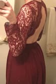 I got this dress as my bridesmaids dress for my sister in laws wedding. The dress is super pretty and a great price! It's pretty long so I'll need to get it hemmed, and the sleeves and chest area are a little loose. It fits around my waist for the most part. I'm 8 weeks postpartum while trying this on so it may fit me differently once I start working out again. - Megan L.