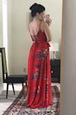 This dress is absolutely amazing! I bought it for my honeymoon and wanted something fun and light. I usually never get red anything, but this is so stunning! Very excited to wear this on my honeymoon! The wrap skirt and lace up top allow for the perfect hourglass fit! Definitely need to wear heels, if you're short like me. Or get it hemmed. Just fyi! - Alli G.