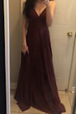 It looks exactly like the photo!! The quality is great and I'm going to be wearing it for prom! Everything fit perfectly except for the length. It was a bit too long because I'm 5'2" but everything else fit perfectly. (SIZE: XS) - Rachel T.