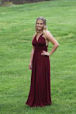 I wore this dress as a prom dress and completely loved it. It is probably the most comfortable dress I've ever worn. Fabric is thick but not too thick and very nice quality. Fit me true to size and didn't have any problems with things falling out or the dress moving. Love how versatile the dress is, I think no matter what your body type is you can find a way to tie it so that it is the most flattering. I am definitely considering buying another one in a different color. - Lacey E.