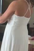 Absolutely beautiful dress. Great quality and very well made. A little long but that's an easy fix.. I'm very satisfied. - Chasity M.