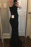 IMPORTANT: The size chart told me I was a S but reviewers of my body type recommended the XS and I'm glad I sized down. Even the XS is a tiny bit loose in some places!! This is a beautiful dress that, particularly for the price, is a great value over expensive dress rentals. The fabric is thick and supportive but not heavy, although it is not quite as soft as I would like (the lining is smooth and soft but the outer fabric is kind of rough/scratchy and is not pleasant to touch). The cut of the dress is sexy and flattering - I am petite but curvy and it fits like a glove. I have a very small chest and it looks great on me, but my lack of bust makes the straps a little too long - an easy fix. The overall length of the dress would only work for someone of my height with 3-4 inch heels, so you should plan to hem or wear heels if you're short. - Heather E.