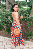 I absolutely fell in love with the dress color, cut, and pattern online. When I got it, it looked just as beautiful in person but I debated returning it because it was so long and about and inch big in the waist. Luckily I know how to hem my own dresses so I kept it but I had to hem about 5-6 inches off. I couldn't even get away with just wearing heels to make it work. So short girls be aware! Still looks great though! Love that the top is adjustable so with a larger chest I was able to feel comfortable. - Katrice S.
