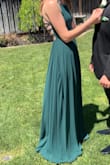 I am pretty tall (5'8") and was worried ordering a small because of length. It was actually too long because with 4 inch heels it was hardly off the ground. That is my only complaint. The rest of the dress fit great!! - Emily T.