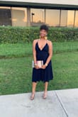 This dress fit perfectly! I often have to get my sleeves altered in my dresses but since the dress straps are adjustable I didn't have too. This dress is great for Spring/Summer and can be worn to just about any event. - Ellena M.