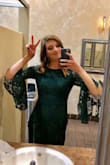Material is high quality, and the dress fit really well. I am tall and the medium was the perfect length. Sleeves are so fun and it was comfortable and classy at the same time! - Angela R.