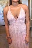 I wore this for my senior prom and loved it!! I ordered according to the size chart and got a large. It was too big one me. I had to take 3 inches off waist, and I got the neckline pinned closer together just because I felt uncomfortable with how deep the V was. - Jaden C.