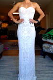 Absolutely loved this dress! Stunning, flattering, and excellent quality with a little bit of stretch for moving and dancing. Runs a little big particularly at the bust (at least for me) but could easily be taken in. Purchased a small (5'4", 130 lbs, athletic build). - Samantha B.