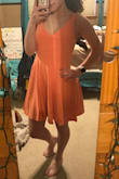 It's a very good quality and love how it fits but it is a little big on the top. I'm a little small and the straps are just a tiny bit too big. Small was definitely the size for me as I feel an xs would be too small everywhere else! Overall love the dress and can't wait to wear it! - Ashley G.