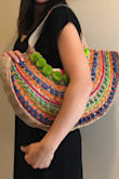 This bag is so colorful and fun! It's perfect for the beach or to make a statement with a causal outfit during the day. It also has a pocket with a zipper for your phone, keys and credit card. It keeps them safe from the sand and makes this bag adorable AND practical. - Ashley T.