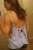 Cute flowy top. Perfect for summer vacay! Probably have to wear it with petals or a bralette - Jackie G.