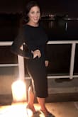 This dress is heaven. I waited and it came back in stock JUST in time for my husband's work christmas party. I cannot tell you how many compliments I got. This is by far my more favorite dress in my closet. No matter your shape, this dress will fit like a glove. I have a very hourglass shape, and I felt confident. My ONLY thing was that it DID ride up through the night just a little bit. But not enough to get on my nerves. I also could have likely gotten away with a Medium, but it still fit fine. I paired this with my sparkle Jimmy Choo shoes and I felt amazing. This dress was worth the wait. - Holly B.