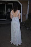 A gorgeous dress! This was perfect for my spring formal. Very light and flowy. Super beautiful style, had many compliments. Loved it. Runs a bit bit in the length of the straps which only adjust a little. Otherwise perfect. - Eva M.