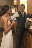 Quality is that of a dress worth $500-700, easily. Lays perfectly, heavy amazing quality. Looks GORGEOUS! Wore this for my wedding. To die for! (Excuse the silly photos, we married New Years Day outside in Buffalo, NY, and I wore a white coat for 99% of the day!) - Jennifer L.